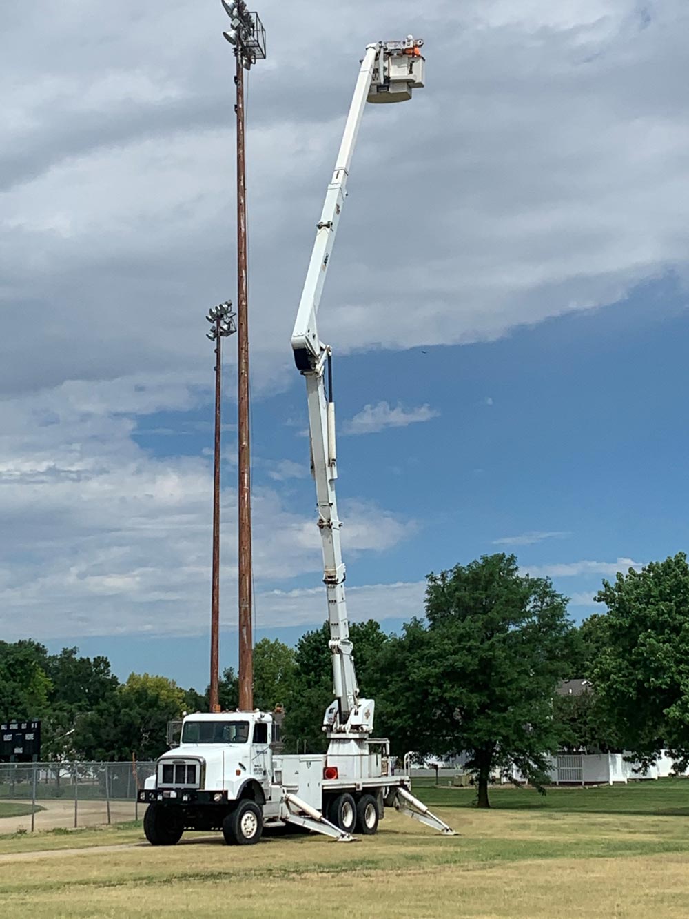 A bucket truck with lift fully extended